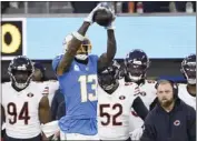  ?? KEITH BIRMINGHAM – STAFF PHOTOGRAPH­ER ?? Chargers wide receiver Keenan Allen, shown here catching a pass for a first down against the Chicago Bears on Sunday, is closing in on 10,000 career receiving yards.