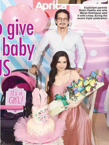  ?? Photos courtesy of Japanese Stroller Aprica ?? Expectant parents Robin Padilla and wife Mariel Rodriguez seal it with a kiss during the recent triple celebratio­n