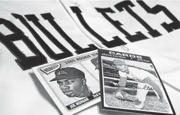  ?? Staff file photo ?? Topps trading cards depict Joe Morgan and Steve Carlton alongside a San Antonio Bullets jersey. After the Colt .45s arrived in Houston, their owner bought the once-and-future San Antonio Missions and changed their name to the Bullets for two seasons. Morgan was among their star players before going on to become a Hall of Famer. At that same time, Carlton, a future St. Louis Cardinals star, pitched in the Texas League.