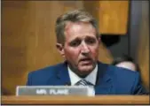  ?? PABLO MARTINEZ MONSIVAIS — THE ASSOCIATED PRESS ?? Sen. Jeff Flake, R-Ariz., speaks before the Senate Judiciary Committee hearing about an investigat­ion, Friday on Capitol Hill in Washington.