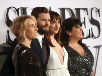  ?? JOEL RYAN/INVISION FOR UNIVERSAL PICTURES ?? Director Sam Taylor-Johnson, left, said she’s “ready to be done” with the Fifty Shades of Grey franchise.