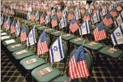  ??  ?? Flags in chairs before the Event.