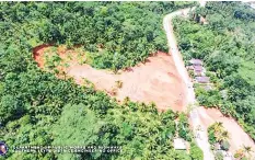  ?? PHOTO COURTESY OF DPWH ?? An aerial view of landslide-hit road section in Sogod, Southern Leyte.