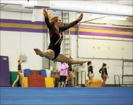  ?? COLEEN MOSKOWTIZ — THE NEWS-HERALD ?? Chardon’s Lily Baker competes at the WRC gymnastics meet on Feb. 15.