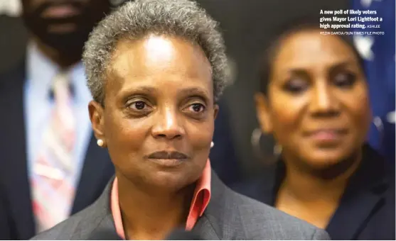  ?? REZIN GARCIA/SUN-TIMES FILE PHOTO ?? A new poll of likely voters gives Mayor Lori Lightfoot a high approval rating. ASHLEE