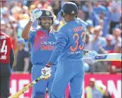  ??  ?? Rohit and Pandya celebrate India’s win against England on Sunday.