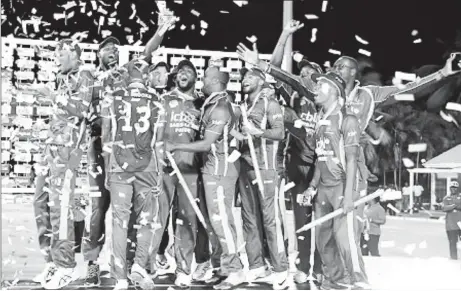  ?? Media) (Photo courtesy WICB ?? Barbados Pride celebrate their capture of the Regional Super50 on Saturday night.