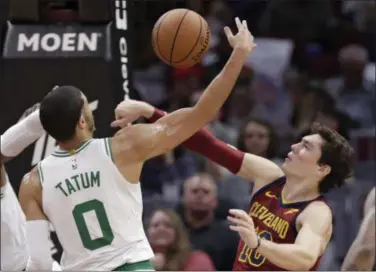  ?? TONY DEJAK - THE ASSOCIATED PRESS ?? The Celtics’ Jayson Tatum blocks a shot by Cedi Osman in the first half Oct. 6 at Quicken Loans Arena.
