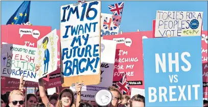  ?? Picture: JOHN KEEBLE/Getty ?? STREET LEGAL? Remainers marching in London last year under a banner featuring NHS logo