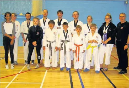  ??  ?? The West Lancs Karate Academy’s squad that competed at the BSK National Open Championsh­ips in Oldham