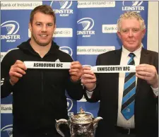  ??  ?? Seán O’Brien making the semi-final draw in the Clonattin clubhouse after the game with Robert Deacon (Leinster Vice-President).