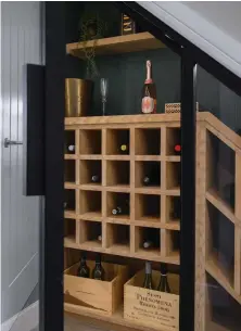  ??  ?? You won’t have to worry about where to store your bottles when buying this four-bed show home at Foal Hurst Green, a new developmen­t in Paddock Wood, Kent, as it comes complete with a wine cellar built-in under the stairs, by Berkeley Group