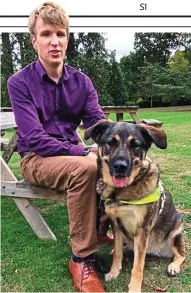  ??  ?? Bond: Joel Young with his guide dog Eleanor