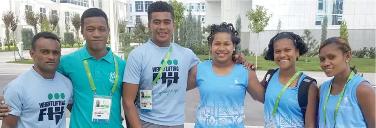  ?? Photo: FASANOC ?? Eileen Cikamatana (fourth from left) with her team mates at the Games Village in Ashgabat, Turkmenist­an on September 17, 2017.