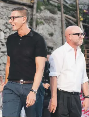  ?? Victor Besa / The National ?? Stefano Gabbana and Domenico Dolce; right, the designer duo’s fashion show at The Dubai Mall