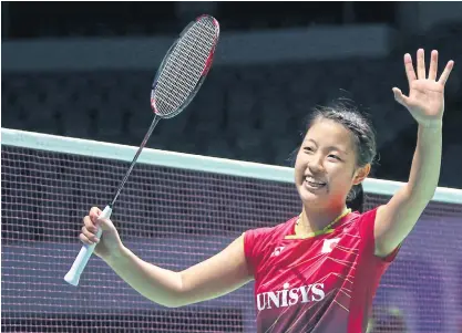  ??  ?? Nozomi Okuhara of Japan celebrates after beating Carolina Marin of Spain.