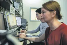  ?? Jin S Lee ?? Left, a laser scanner produces a map of the brain for the NYUAD research; above, Esti Blanco-Elorrieta and Prof Liina Pylkkanen, right, study how the brain processes language