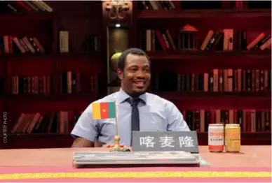  ??  ?? Hermann Mefire, representi­ng Subsahara Africa on Hubei TV program, , gives his opinion on cultural difference­s between China and the rest of the world