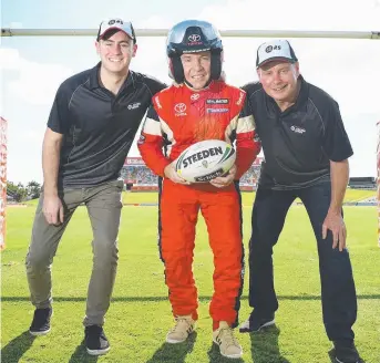  ?? FAST FRIENDS: North Queensland Cowboys coach Paul Green with father and son team from the Toyota 86 racing series Harry and Neal Bates. Picture: ZAK SIMMONDS ??