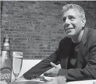  ?? Tribune News Service ?? ■ Celebrity chef and author Anthony Bourdain photograph­ed at Tintol restaurant in New York’s Times Square. Bourdain was found dead in his hotel room on June 8 of an apparent suicide.