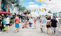  ?? MIKE STOCKER / SUN SENTINEL ?? After being closed more than a year, the open-air Yellow Green Farmers Market will reopen to the public April 17 with fresh COVID-19 rules and outdoor-seating upgrades.