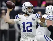  ?? MICHAEL WYKE — THE ASSOCIATED PRESS ?? Andrew Luck and the Colts took care of the Texans on Saturday to earn a date next weekend against the Chiefs.