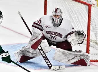  ??  ?? TOP, JOHN QUACKENBOS / BOSTON COLLEGE ATHLETICS; RIGHT, COURTESY OF THOM KENDALL / UMASS ATHLETICS BACKSTOP: At top, UMass goaltender Filip Lindberg stops a scoring chance by Boston College forward Alex Newhook during a game on Feb. 26.
At right, Lindberg prepares to make a save against Bemidji State on Saturday night.