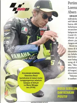  ??  ?? PULIHKAN KONDISI: Valentino Rossi beristirah­at di dekat motor tunggangan­nya sebelum balapan di Sirkuit Le Mans Minggu lalu (11/10).