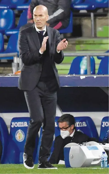  ?? Agence France-presse ?? Real Madrid’s coach Zinedine Zidane gestures during their Spanish League match against Getafe on Sunday.