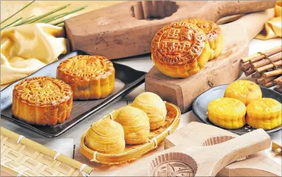  ?? SUBMITTED PHOTO ?? Moon cakes, above, are to the Mid-Autumn Festival in China what mincemeat pies are to Christmas.