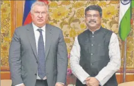  ?? PTI ?? ■ Rosneft chairman Igor Sechin with oil minister Dharmendra Pradhan in New Delhi on Tuesday.