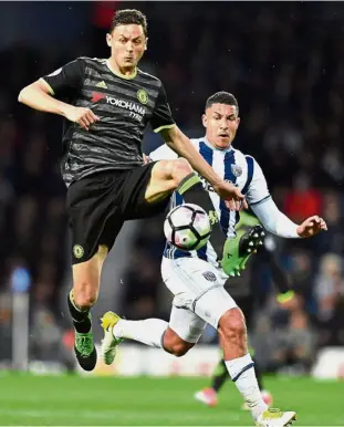  ??  ?? New acquisitio­n: Nemanja Matic (left) is on the verge of completing a move from Chelsea to Manchester United. — AFP