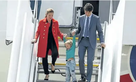  ?? MORRIS MACMATZEN/GETTY IMAGES ?? Prime Minister of Justin Trudeau with wife Sophie Trudeau and their youngest son Hadrien arrive at Hamburg Airport for the G20 economic summit on Thursday in Hamburg, Germany. Leaders of the G20 group of nations are meeting for the July 7-8 summit....