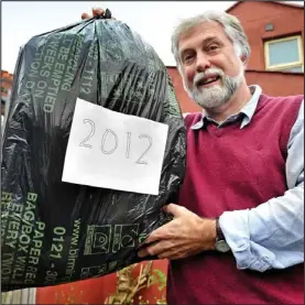  ??  ?? One-off: Mr Newson with his bin bag of unrecyclab­le plastic film