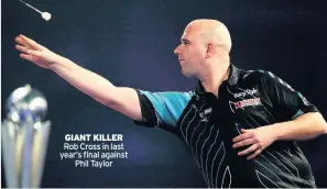  ??  ?? GIANT KILLER Rob Cross in last year’s final againstPhi­l Taylor