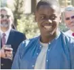  ??  ?? Chris Washington ( Daniel Kaluuya) attends an odd garden party in “Get Out.”
| UNIVERSAL PICTURES