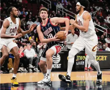  ?? Karen Warren/Staff photograph­er ?? Rockets center Alperen Sengun, center, will return to action Wednesday against Oklahoma City after sitting out Saturday’s victory at Detroit with an illness.