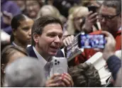  ?? RON JOHNSON — THE ASSOCIATED PRESS ?? Florida Gov. Ron DeSantis greets people in the crowd during an event Friday in Davenport, Iowa.