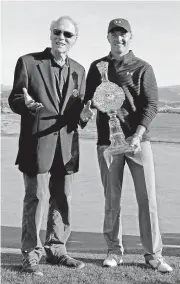  ?? JOSE CARLOS FAJARDO/STAFF ?? Jordan Spieth poses with Clint Eastwood after winning at Pebble Beach. Spieth, at 23, has won 12 pro tournament­s.