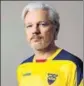  ?? REUTERS ?? Julian Assange poses in an Ecuadorian jersey.