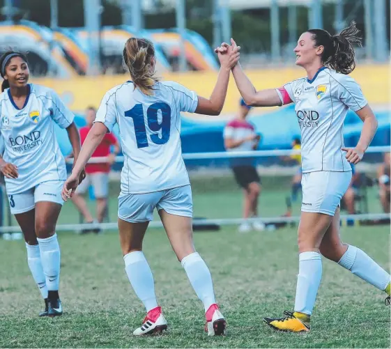  ?? Picture: CRAIG CLIFFORD@SPORTSPICS ?? Gold Coast United’s men might have been disappoint­ed but the women had a goal to Neesa Doyle (right) to thank for their win.