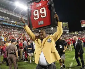  ?? TAMPA BAY TIMES 2013 ?? Former Buccaneers great Warren Sapp says he’s already experienci­ng memory loss at age 44 and blames “the banging we did as football players.”