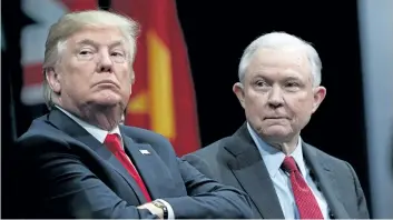  ?? EVAN VUCCI/ THE ASSOCIATED PRESS ?? U. S. President Donald Trump sits with Attorney General Jeff Sessions during the FBI National Academy graduation ceremony on Friday, in Quantico, Va.