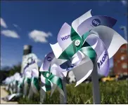  ??  ?? Pinwheels setup by the staff of Safe Berks at the agency in Reading Friday afternoon April 2, 2021. The staff members put out 250 pinwheels to symbolize local victims of sexual assault as part of their event, “Recognizin­g & Rememberin­g Victims of Sexual Assault – Known & Unknown,” during Sexual Assault Awareness Month.