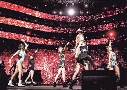  ?? RICH FURY/GETTY IMAGES FOR COACHELLA ?? Blackpink performs last week at the Coachella Valley Music and Arts Festival in Indio, California. The group was the first K-pop female act to play the event, a performanc­e that was simulcast in Times Square.