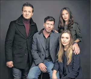  ?? AP PHOTO ?? In this Jan. 21, 2017 file photo, actor Jeremy Renner, from left, Director Taylor Sheridan, actress Elizabeth Olsen and actress Kelsey Asbille Chow pose for a portrait to promote the film, “Wind River”, during the Sundance Film Festival in Park City,...