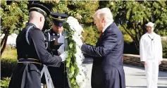  ?? — Reuters photo ?? Trump lays a wreath during the 9/11 observance at the National 9/11 Pentagon Memorial in Arlington.