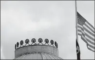  ?? AP/GERRY BROOME ?? The U.S. flag flies at half-staff over the state Capitol in Raleigh, N.C., on Wednesday in remembranc­e of six Marines and a Navy sailor from Camp Lejeune who were among 16 service members killed Monday when their plane crashed in a field in rural...