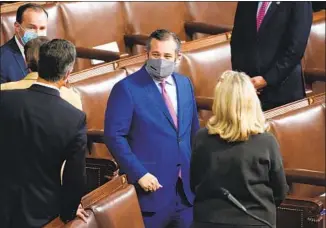  ?? Kevin Dietsch Getty I mages ?? SEN. TED CRUZ arrives for the joint session of Congress on Wednesday. His opening speech declared his loyalty not to America’s majority but to a mostly demented, largely far- right minority.