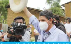  ?? — AFP ?? Peruvian presidenti­al candidate for the Peru Libre (Free Peru) Party, Pedro Castillo, waves as he leaves a polling station in Cajamarca, Peru, after casting his vote during general elections.